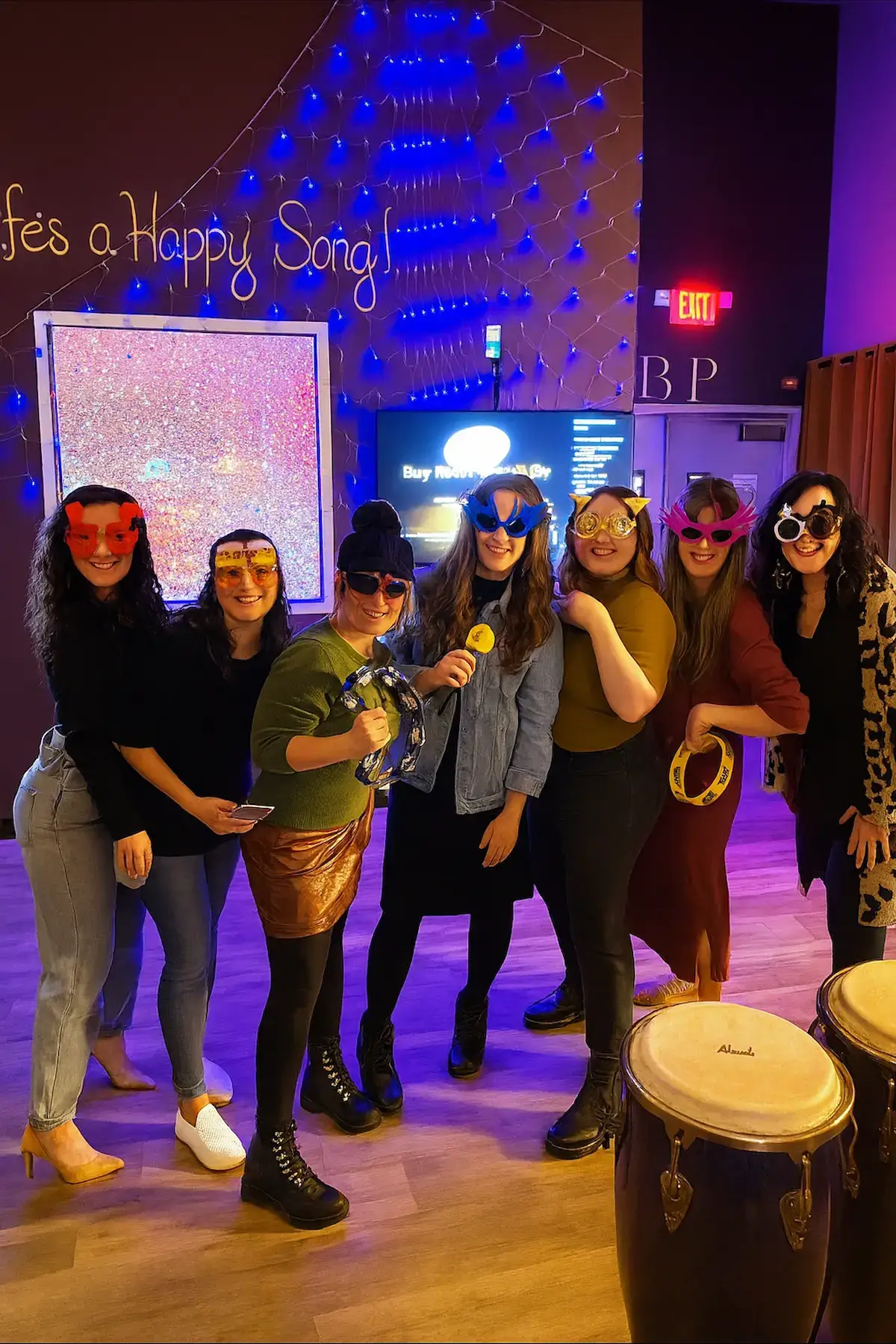 Guests celebrating at Black Parakeetz Karaoke Lounge