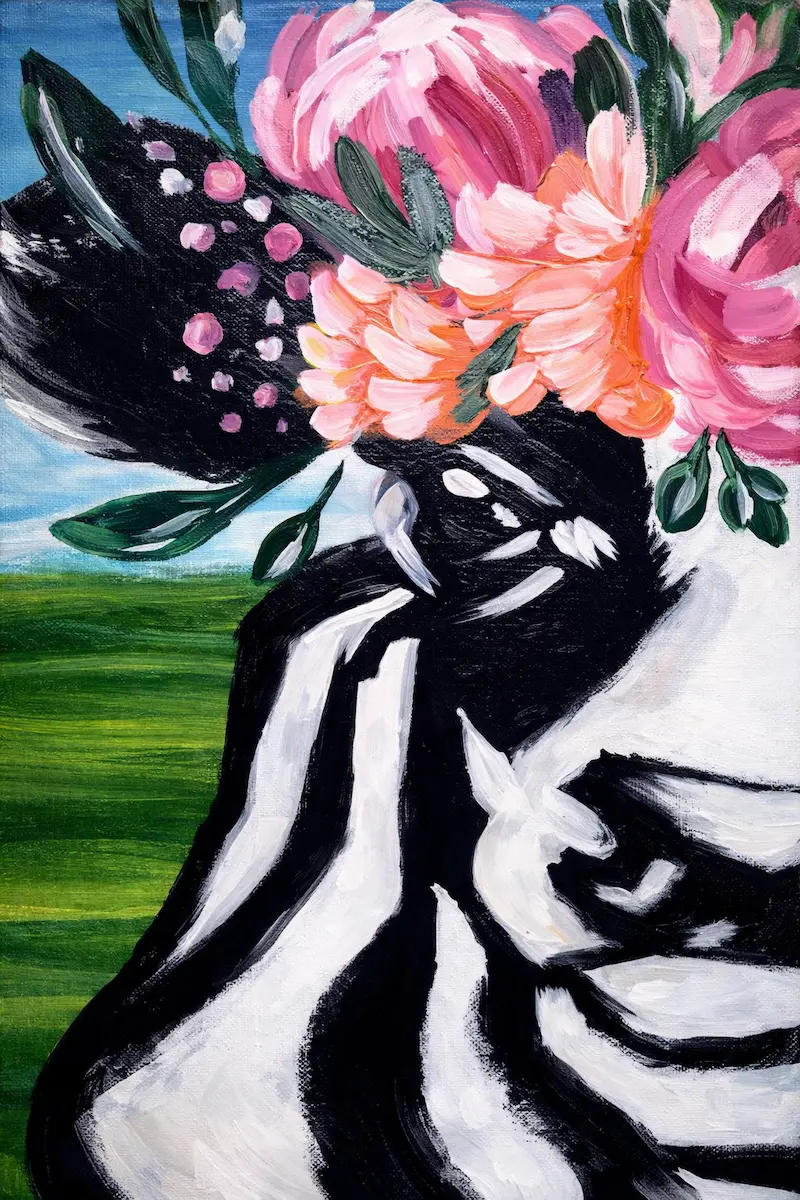 Zebra with colorful flower crown painting.