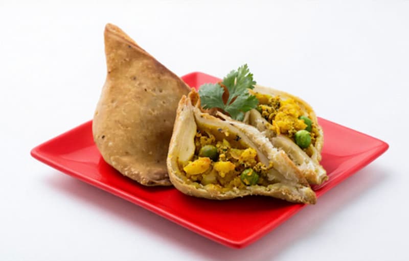 Punjabi Samosas with Mango Chutney Sauce at Black Parakeetz